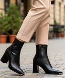 Comprar bota feminina cano curto de couro com salto grosso e zíper traseiro para looks elegantes e confortáveis no inverno barato DAFITI