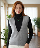 Women's oversized V-neck sweater vest in silver gray, close-up detail