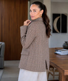Women's brown plaid blazer, back view with side slit