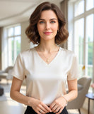Comprar blusa social feminina em cetim champagne com decote V elegante para escritório, reuniões e eventos formais em promoção ZARA