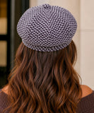 Back view of the brown houndstooth tweed newsboy cap's 8-panel crown