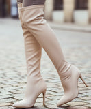 Comprar bota feminina cano longo em camurça salto fino e bico elegante para looks de inverno sofisticados AREZZO