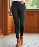 Women's fleece-lined leggings in black with a second-skin fit