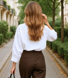 Comprar camisa de linho feminina branca oversized com manga longa para looks casuais ou ambiente profissional em promoção AMARO