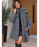 Women's short coat with scarf in grey styled with leather shorts and tall boots