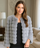 Women's cropped vegan fur jacket in grey, styled look