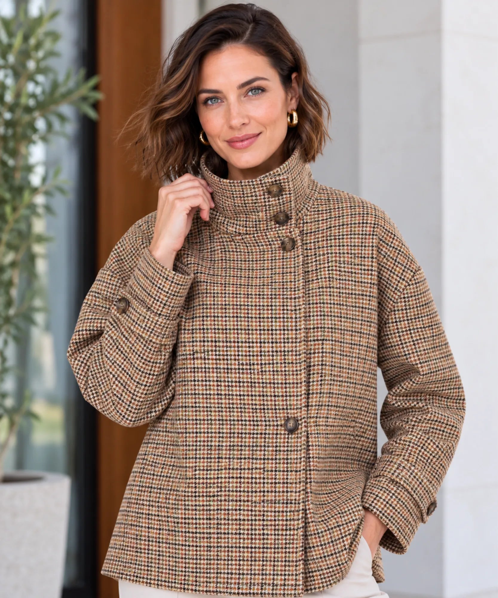 Women's houndstooth jacket in brown with buttoned funnel neck