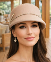Women's vintage felt cloche hat in beige, side view