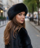 Woman wearing a Women's Plush Fur Hat in Black with a wide Russian-style band