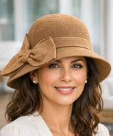 Women's vintage cloche hat in camel with a side bow