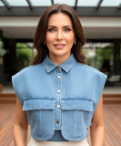 Women's cropped denim vest in blue, side view showing boxy silhouette