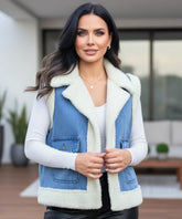 Women's sherpa-lined denim vest in blue, styled look