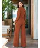 Close-up of the crepe fabric on the brown blouse and pants set