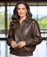 Women's boxy oversized leather jacket in cognac, back view
