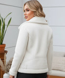 Woman wearing a shearling leather jacket in ivory