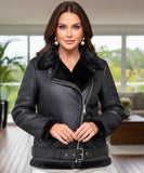 Woman wearing a shearling leather jacket in black