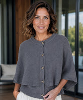 Women's cashmere-soft sweater cape in grey with button front, front view