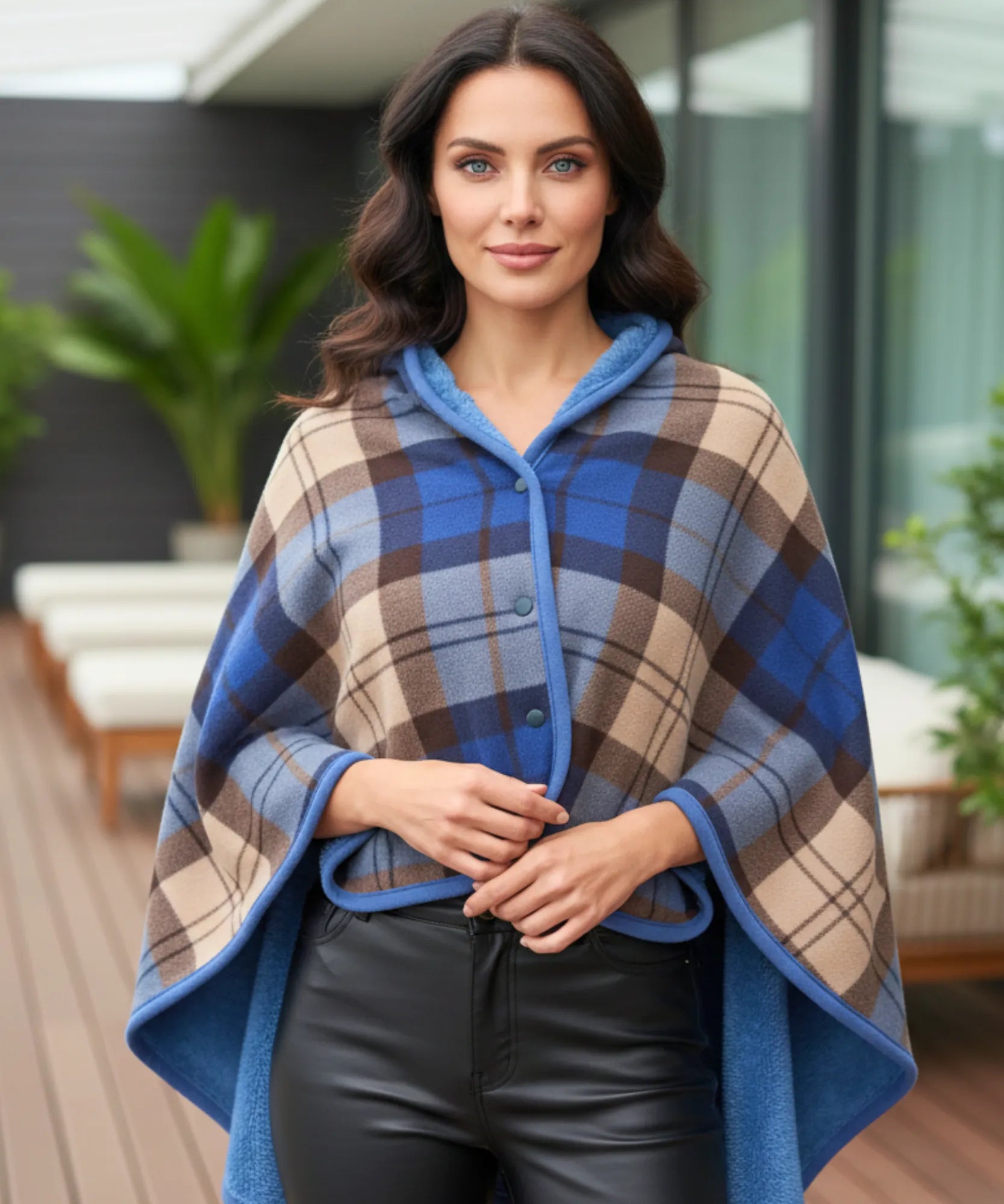 Women's plaid blanket poncho in blue and camel plaid with button front, front view
