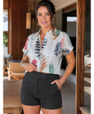 Women's black dress shorts with wide waistband styled look