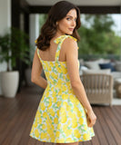 Women's boho mini dress in yellow fruit print, close up of fabric