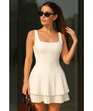 Women's tiered ruffle mini dress in white, front view