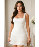 Women's tiered ruffle mini dress in white, close up