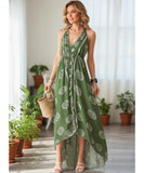 Women's boho halter maxi dress in green print, close up