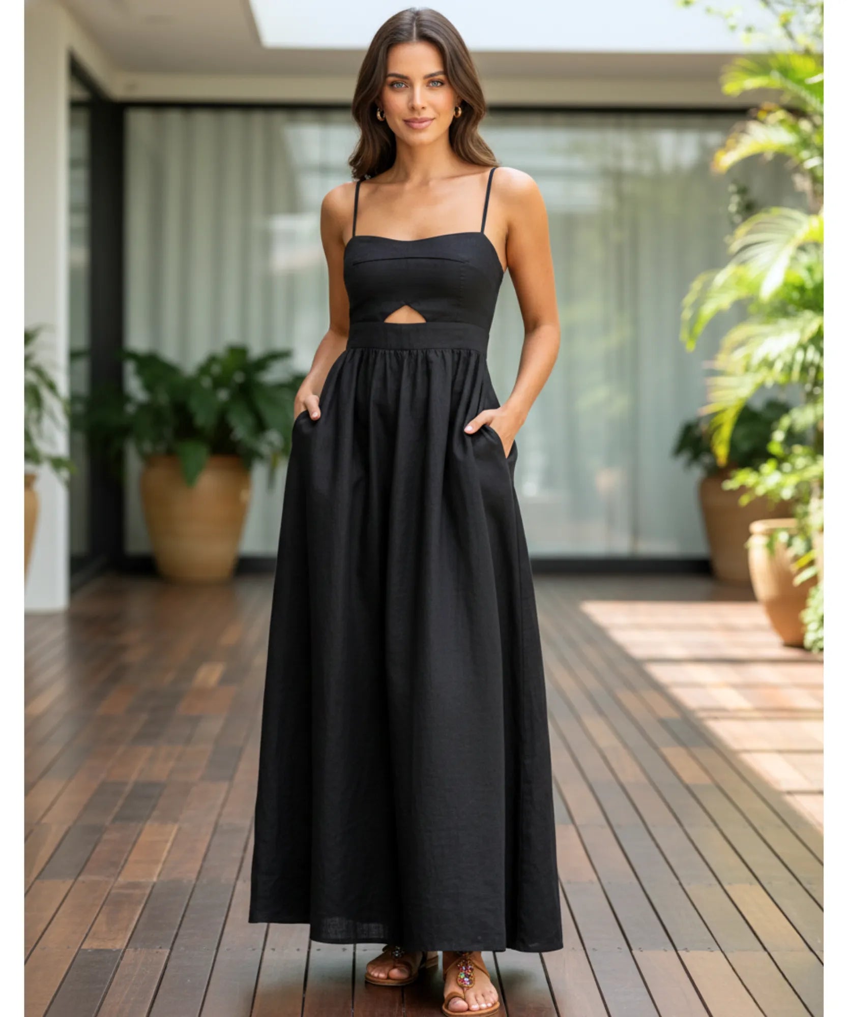 Women's black cutout maxi dress, side view