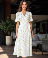 Women's floral wrap midi dress in yellow floral print, front view