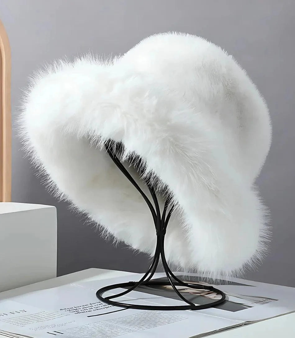 White fur bucket hat with a structured brim, front view