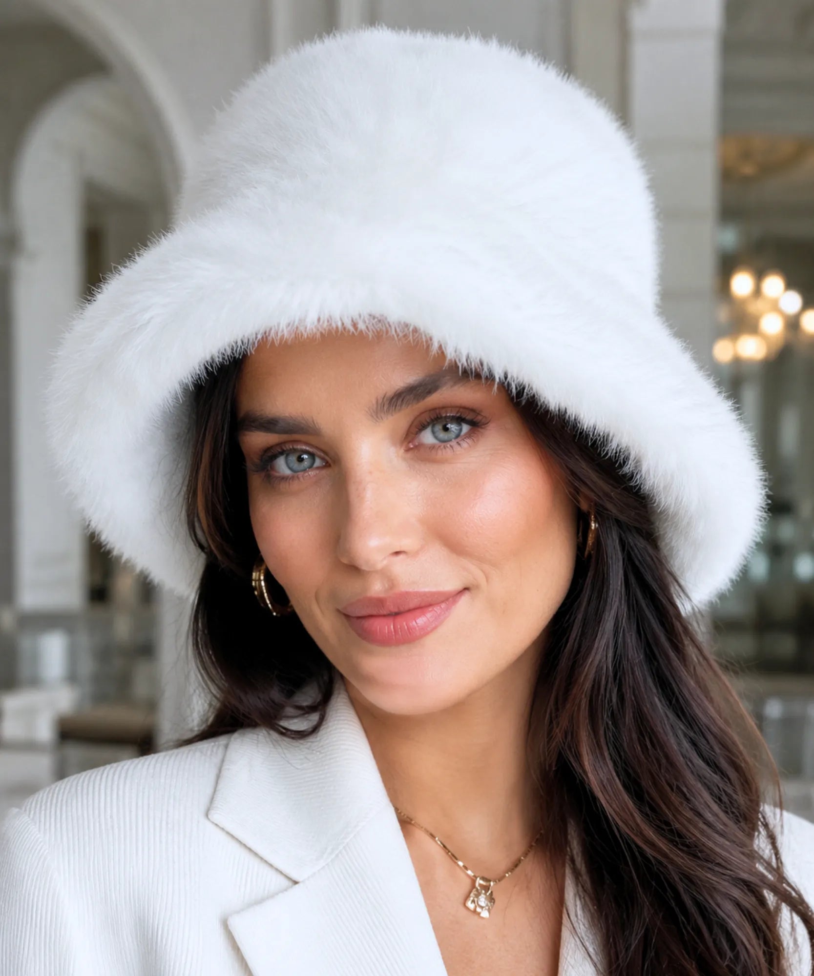 White fur bucket hat with a structured brim