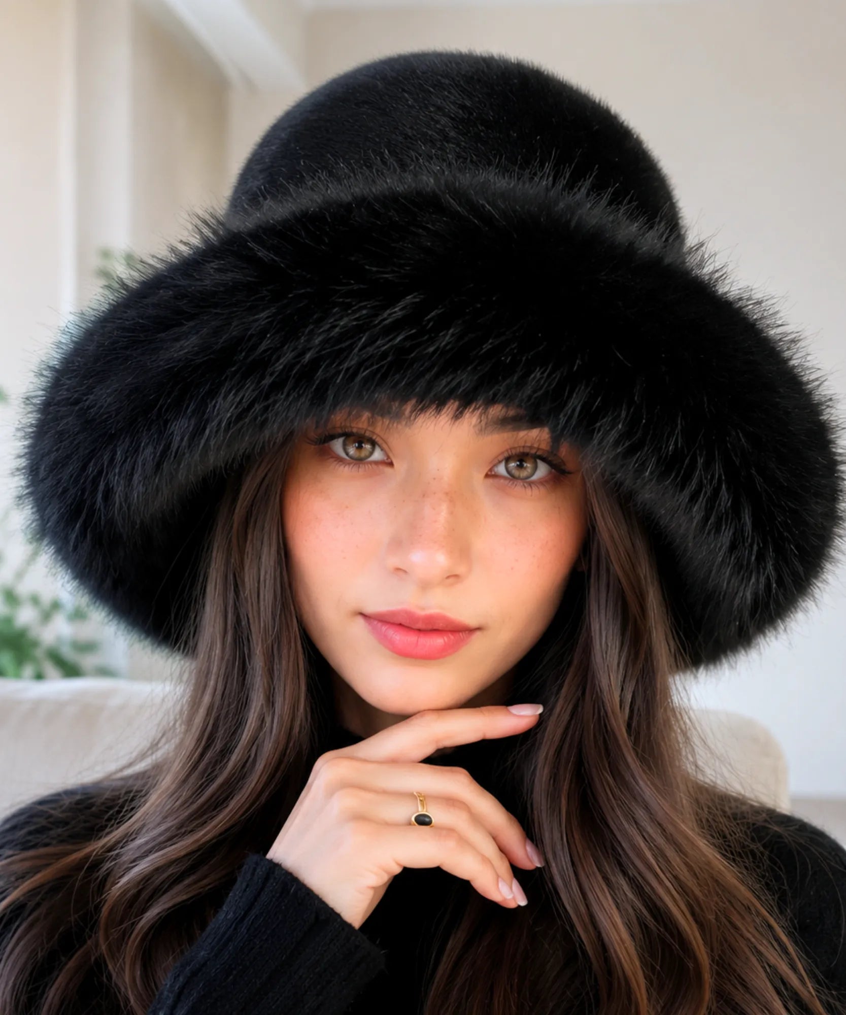 Black fur bucket hat with a structured brim, close-up front view