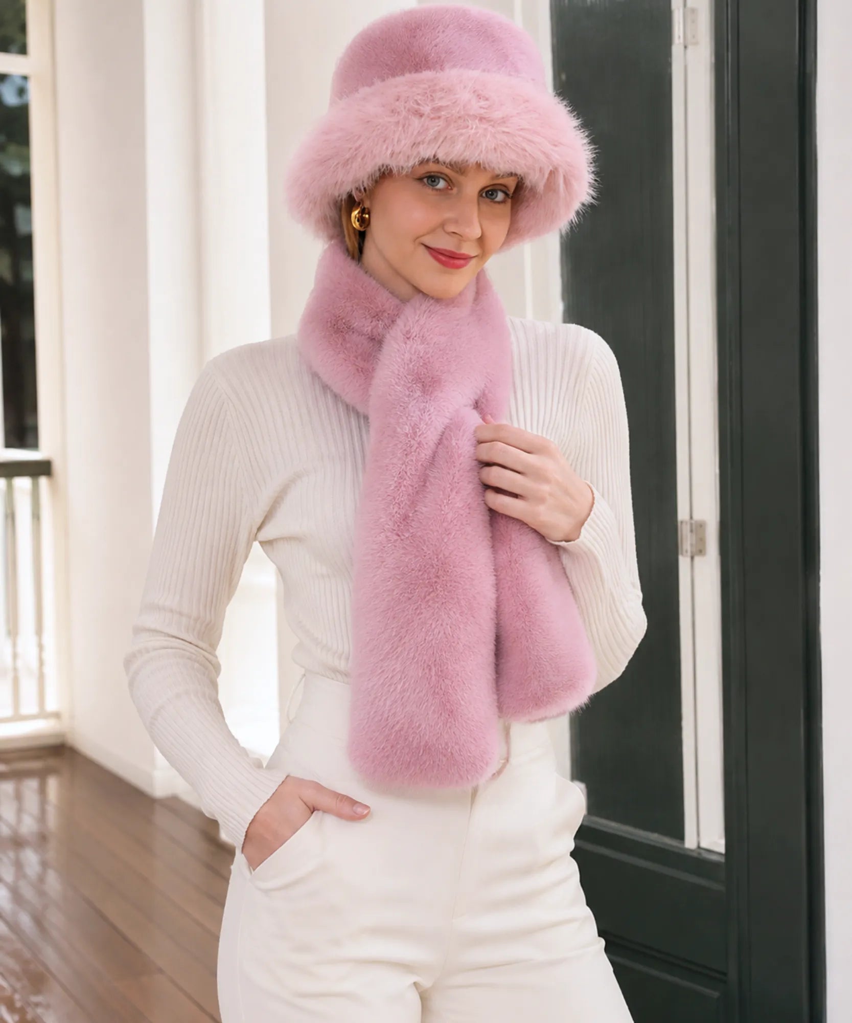 Woman wearing a Blush Pink fur bucket hat, front view