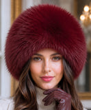 Women's Leather Trapper Hat in Burgundy with a plush fur trim