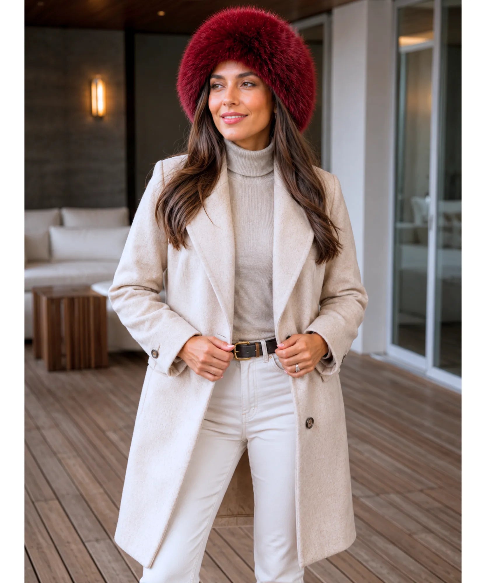 Women's Leather Trapper Hat in Burgundy styled with a beige coat and white jeans