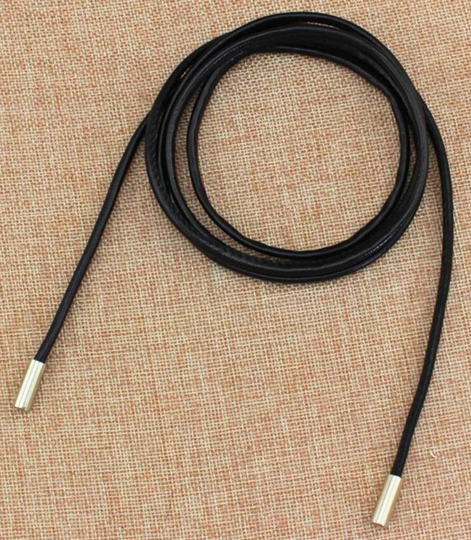 Women's thin rope belt in black vegan leather with gold metal tips