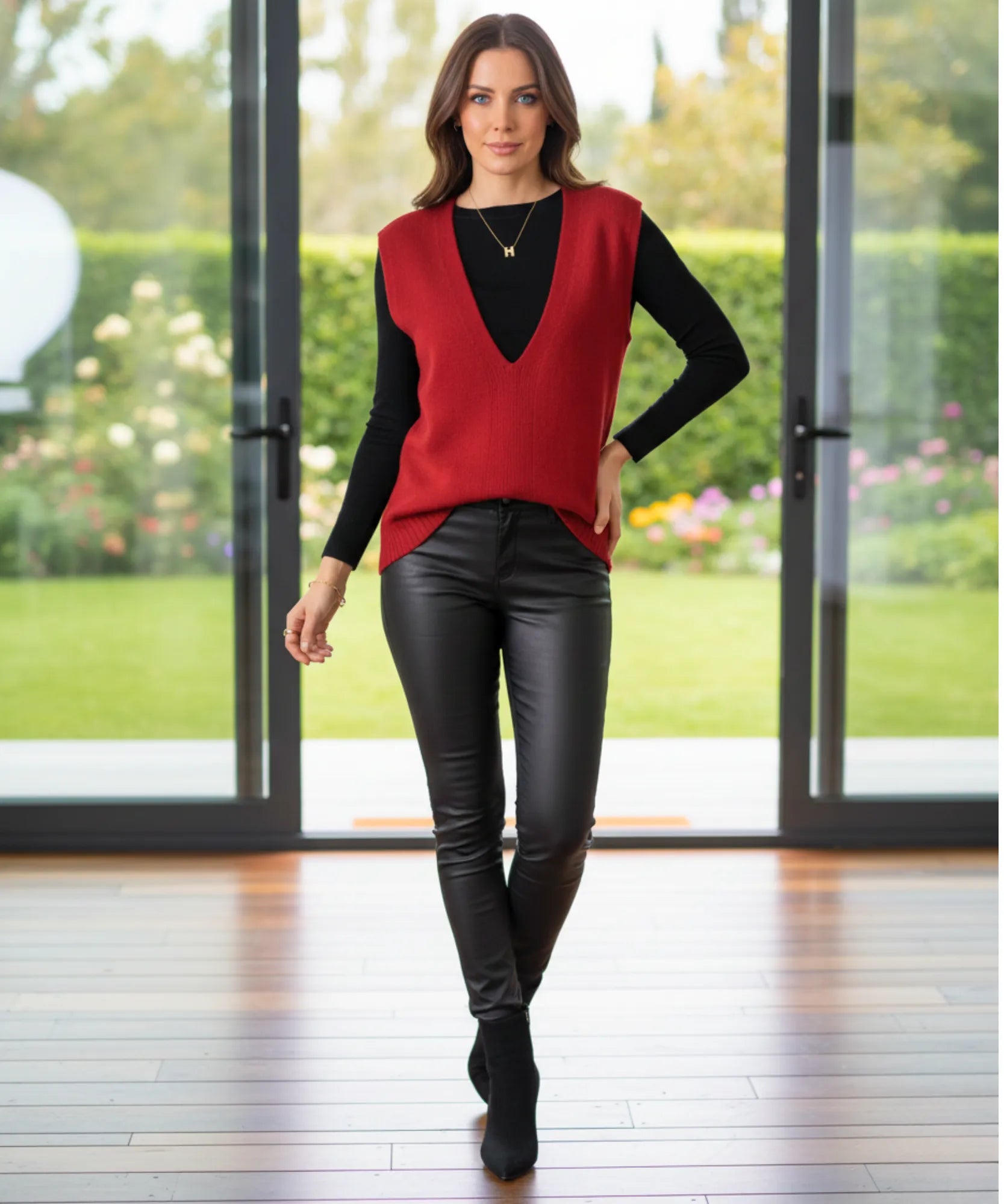 Women's oversized V-neck sweater vest in red, front view
