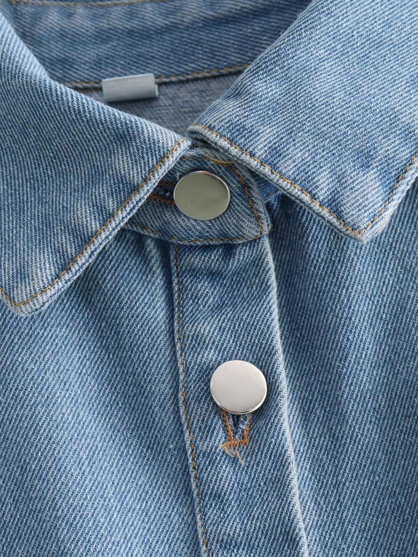 Women's cropped denim vest in blue with front flap pockets