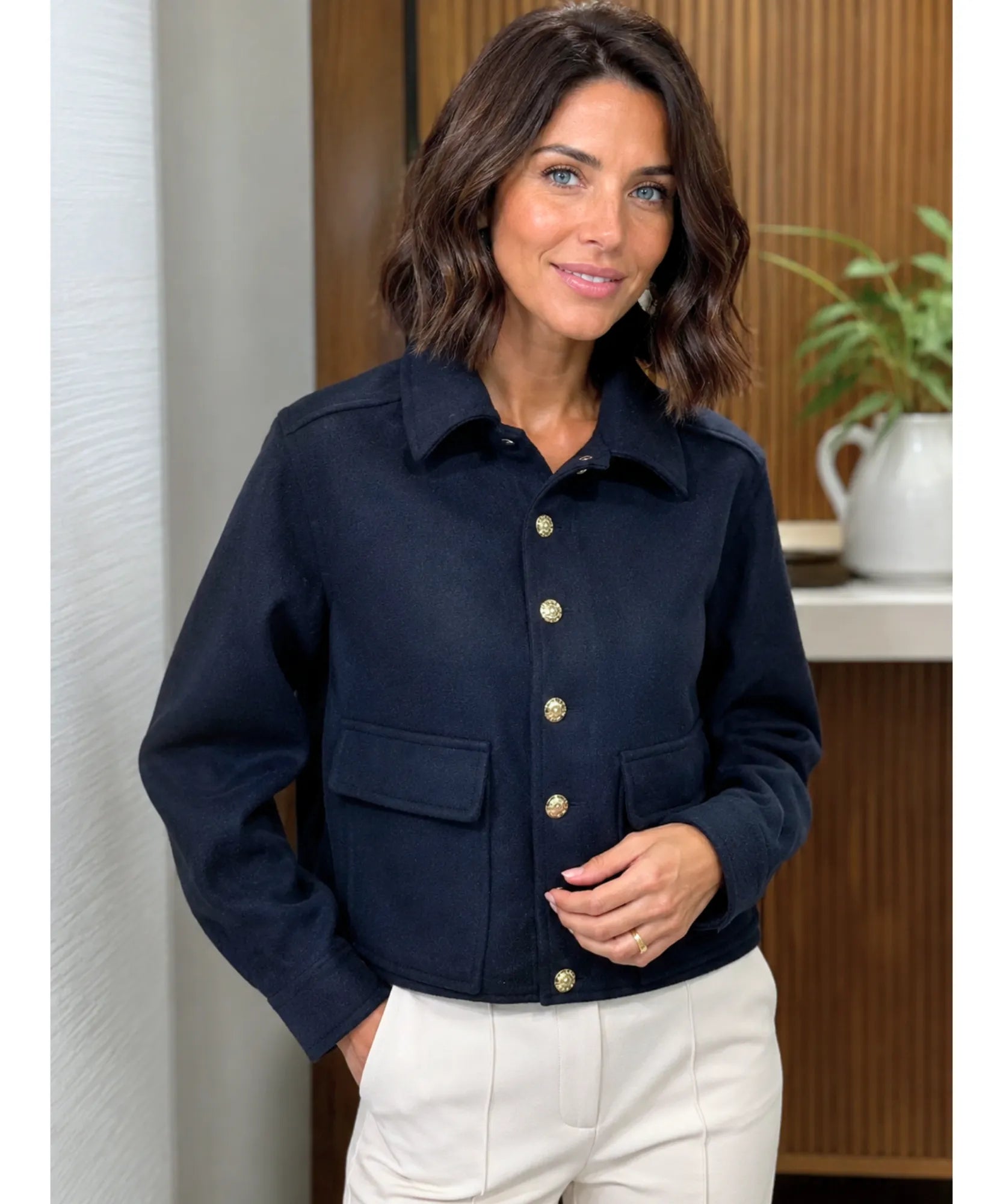 Women's bouclé blazer in navy, close-up texture