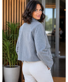 Women's bouclé blazer in grey, styled look
