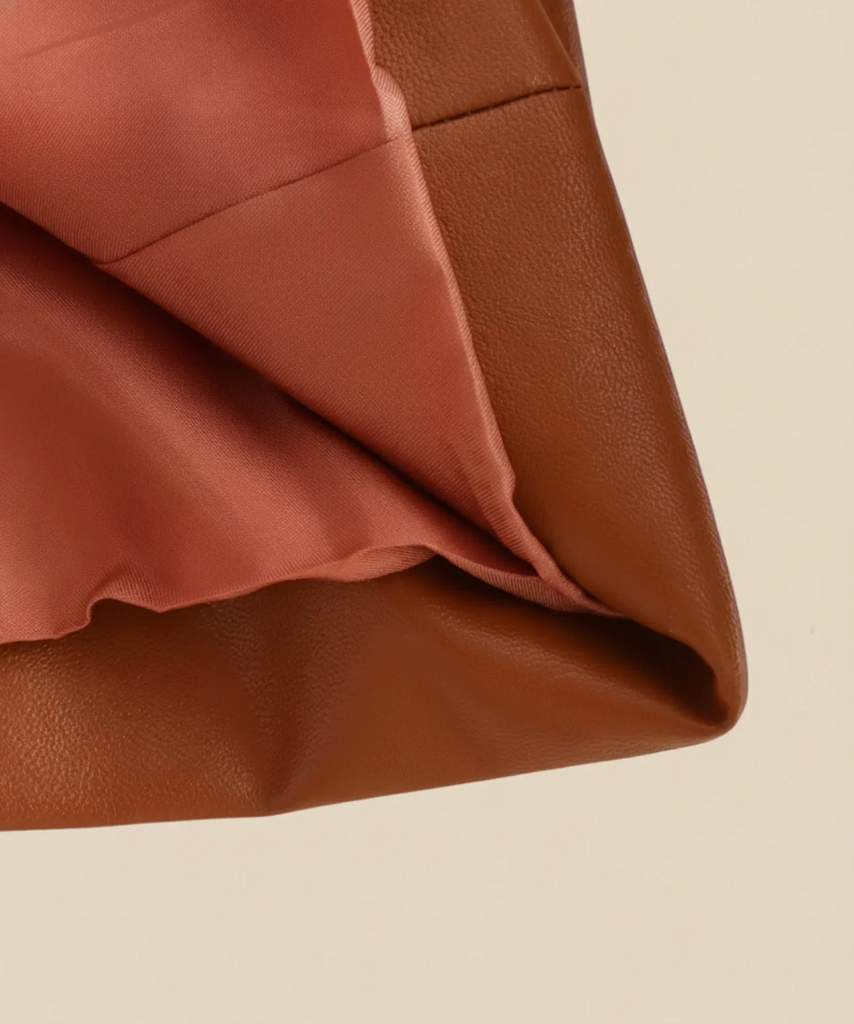 Women's leather blazer with gold buttons in cognac, detail view