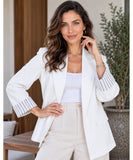 Women's white linen blend blazer with striped cuffs worn open over a white top