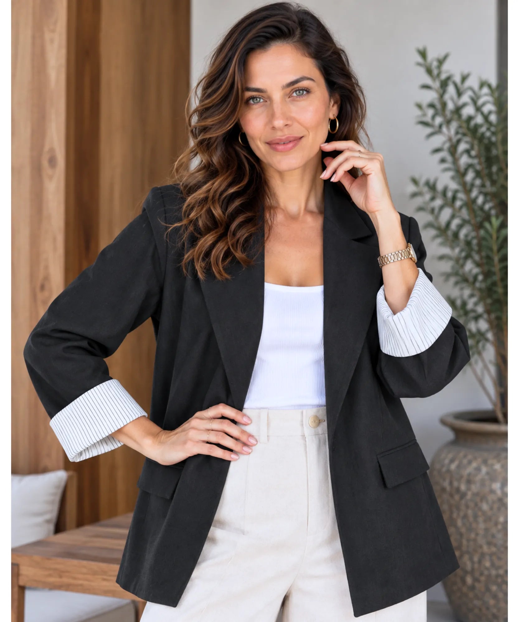 Women's black linen blend blazer with rolled striped cuffs, full length view