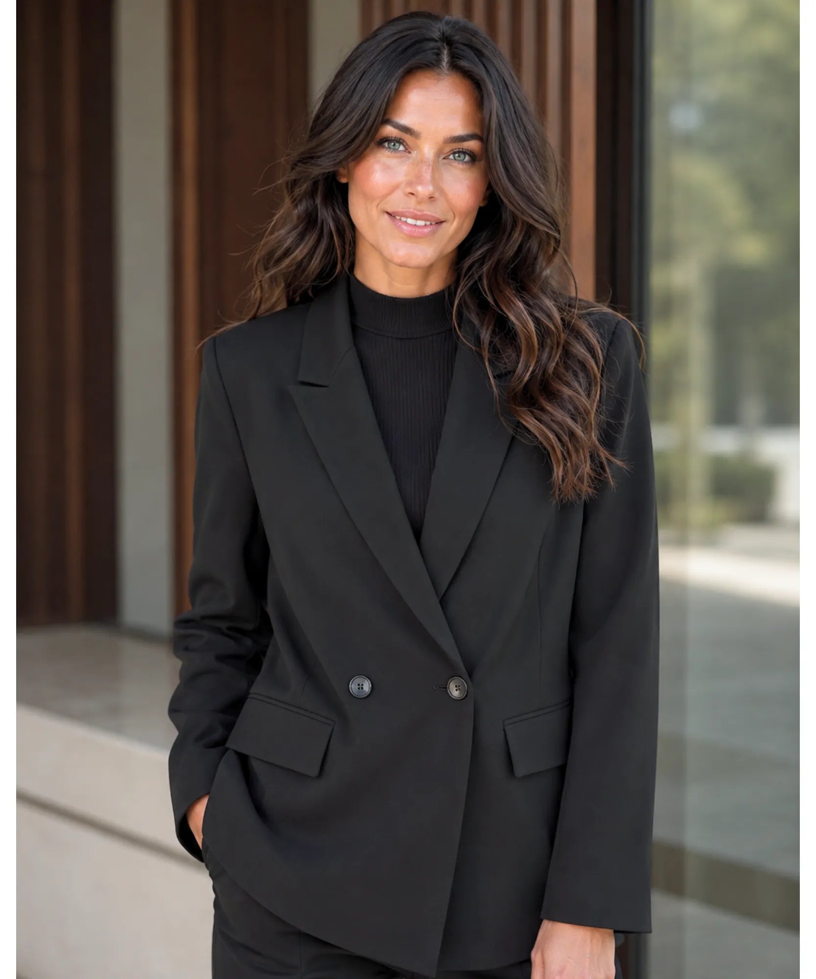 Black double breasted blazer with a turtleneck top