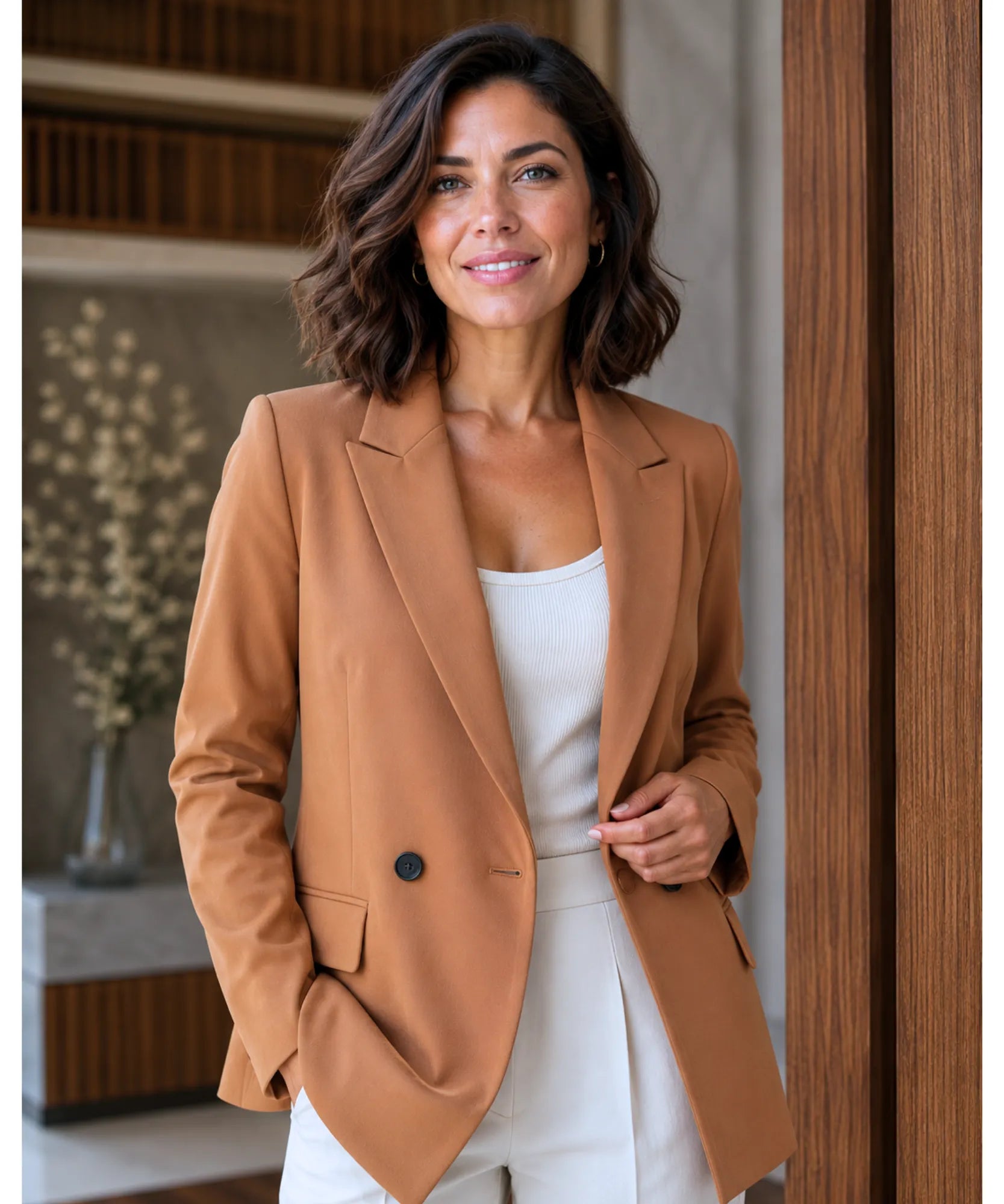 Women's caramel double breasted blazer with a single visible button, front view