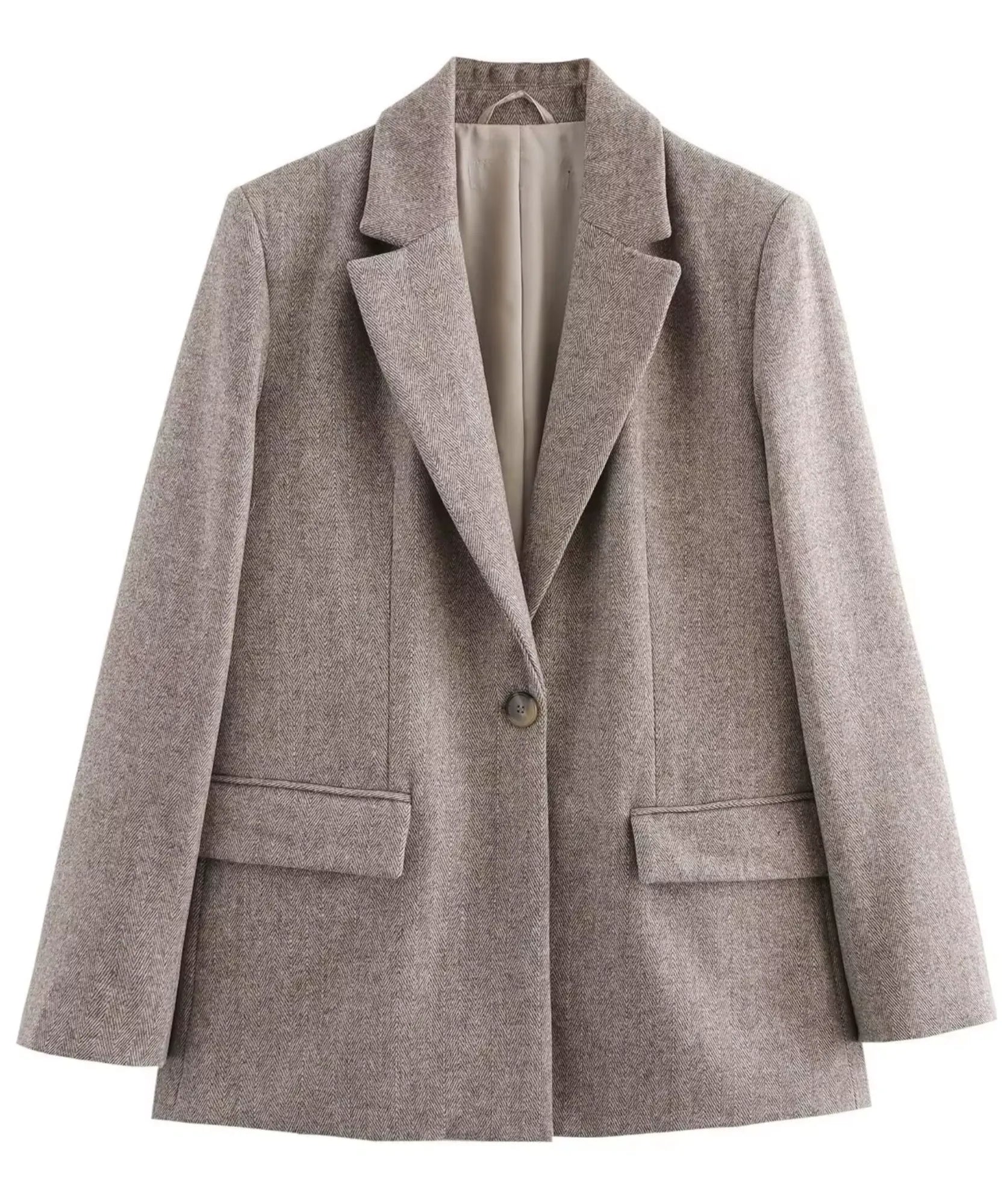 Beige one button blazer with a lined interior