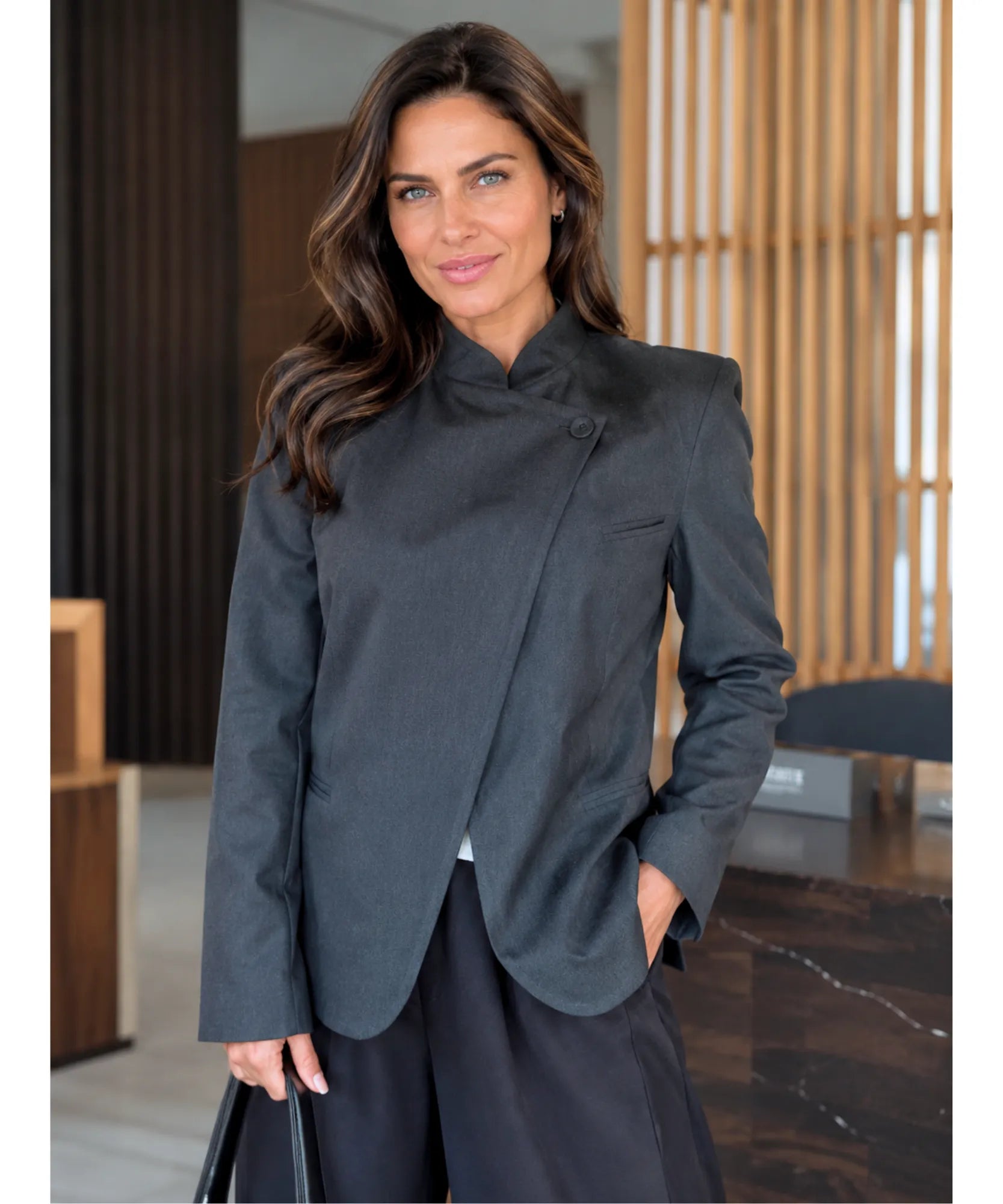 Women's dark grey high collar blazer with wrap front