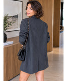 Charcoal pinstripe oversized blazer, back view with a black handbag