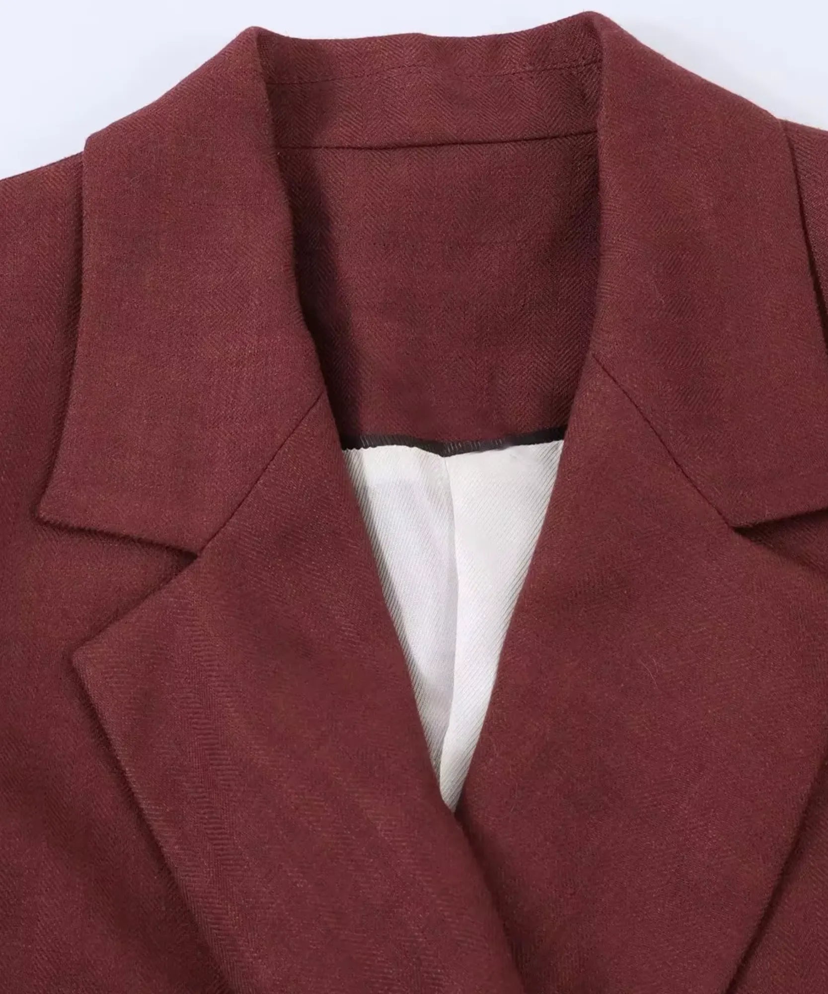 Close up of the lapel on the Mahogany wrap blazer