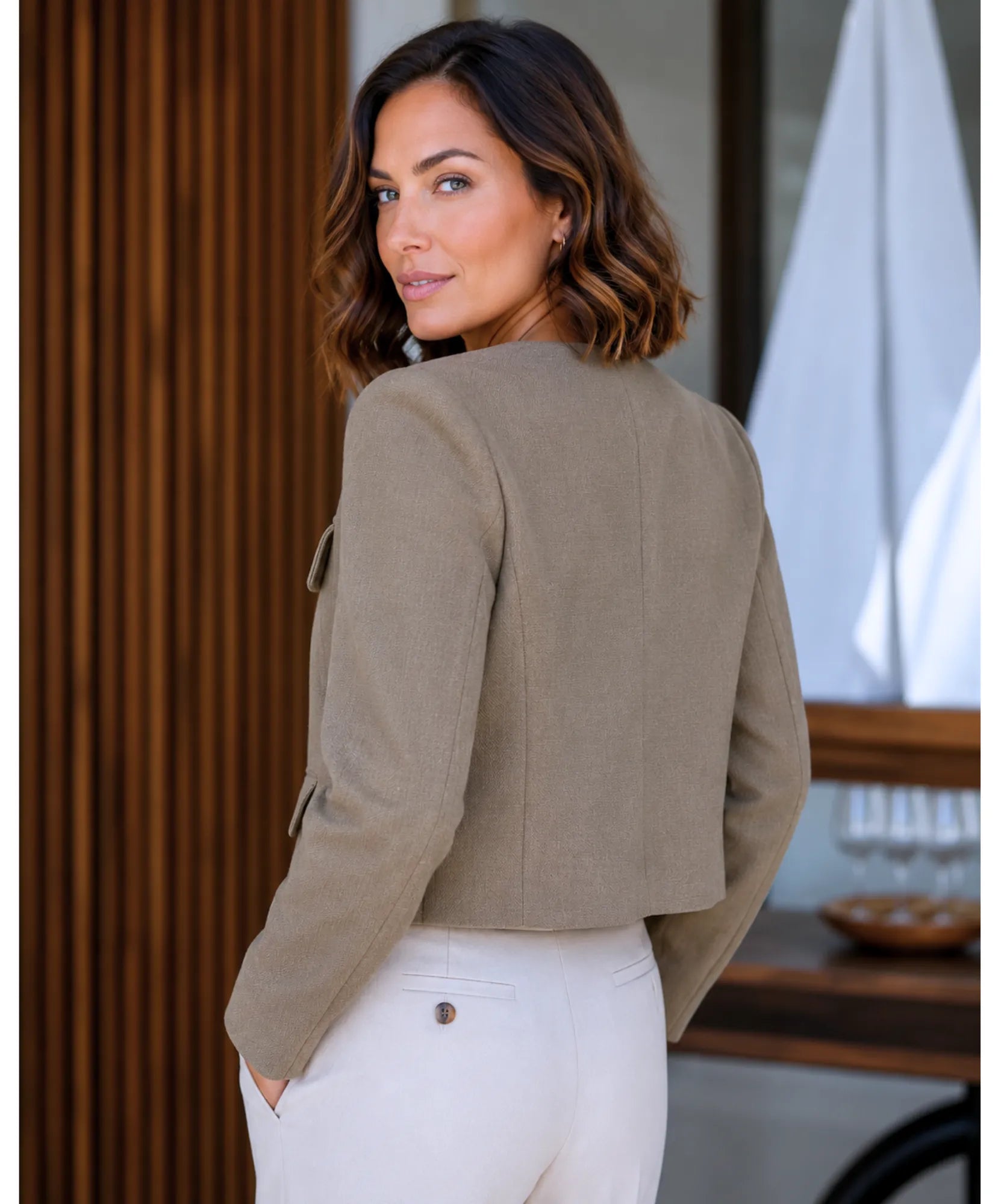 Tan cropped tweed blazer, back view